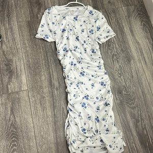 long scrunched white and blue flowered dress